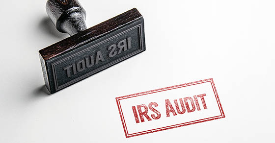 Rubber,Stamping,That,Says,’irs,Audit’.